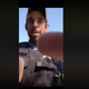 The unidentified officer is seen reaching for the young man’s camera
